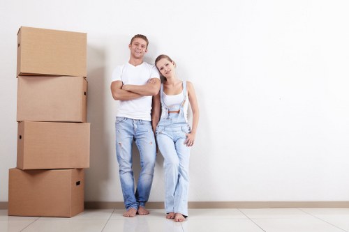 Local removals team planning a Clapham home move with boxes and furniture