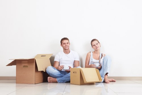 Safety-focused moving team assessing a property access route