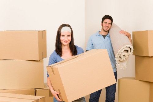 Local Clapham moving team handling furniture carefully during transport