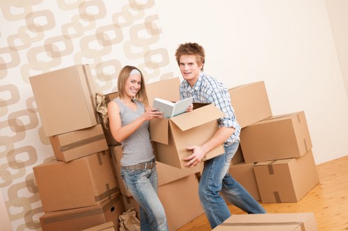 Professional movers transporting belongings from a Clapham flat