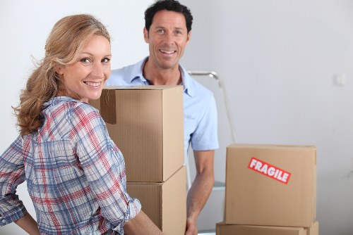 Trained movers handling furniture with care during a Clapham move