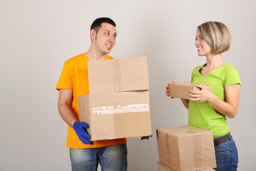 Careful wrapping of fragile household items during a local move